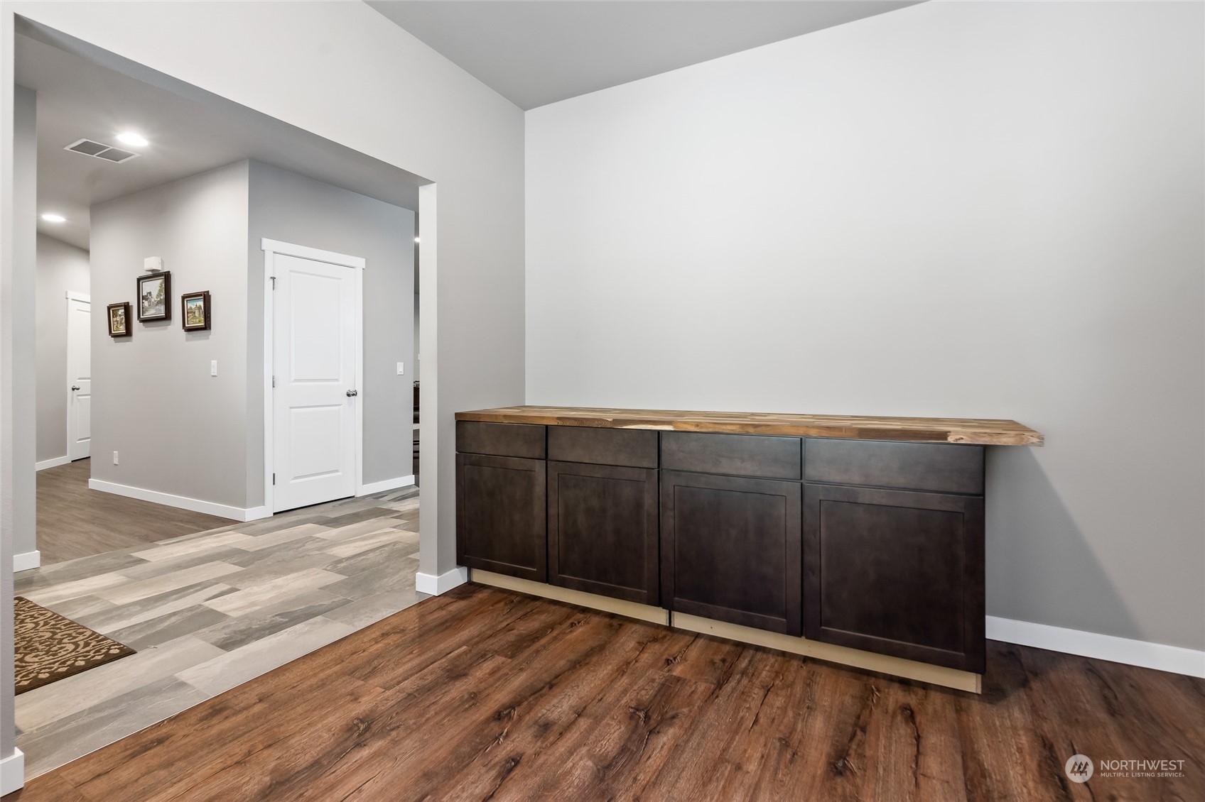 7101 Vandermark Road East Bonney Lake, WA 98391 - Photo 13 of 39 an empty room with wooden floor