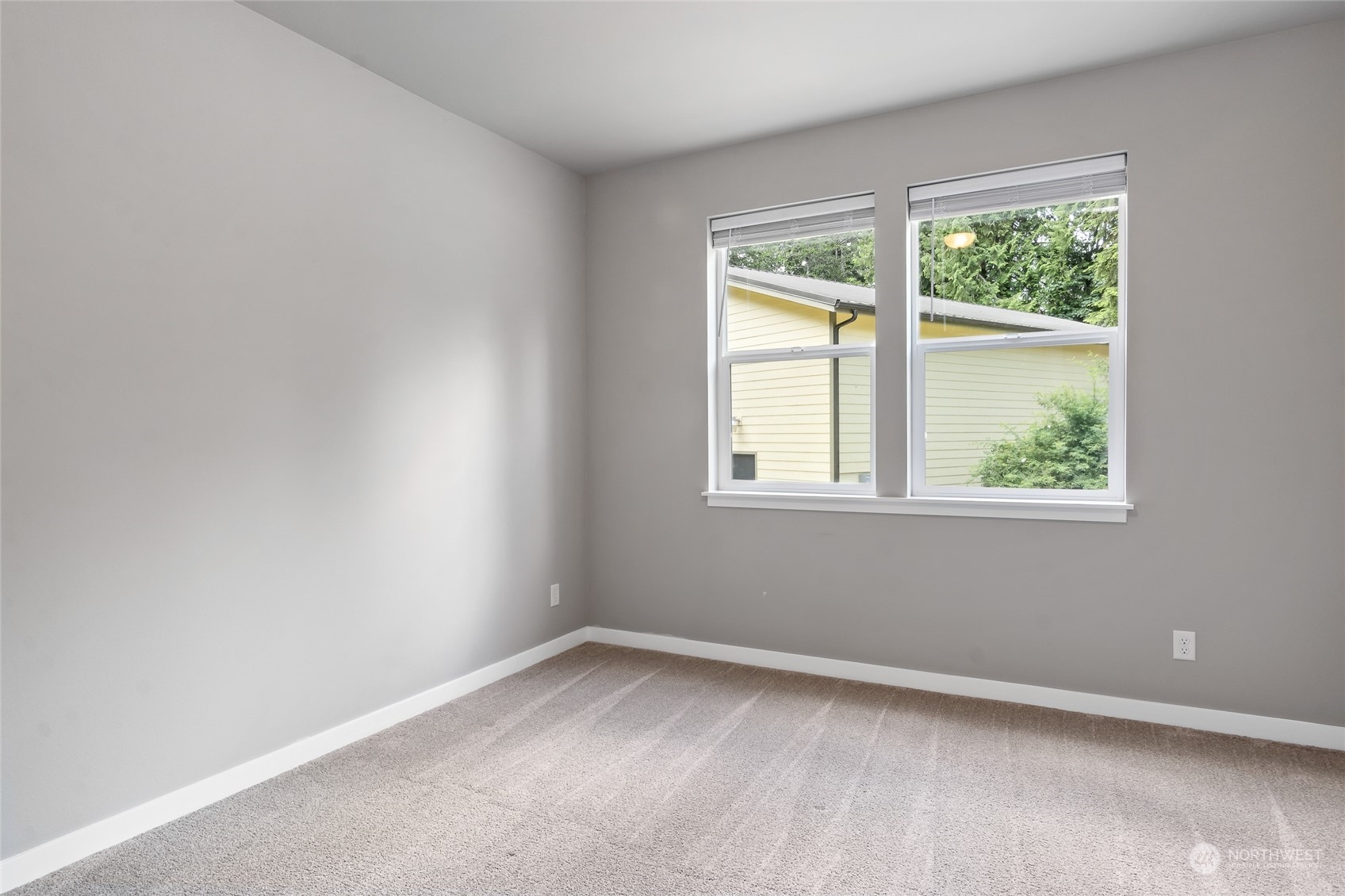7101 Vandermark Road East Bonney Lake, WA 98391 - Photo 16 of 39 an empty room with a window