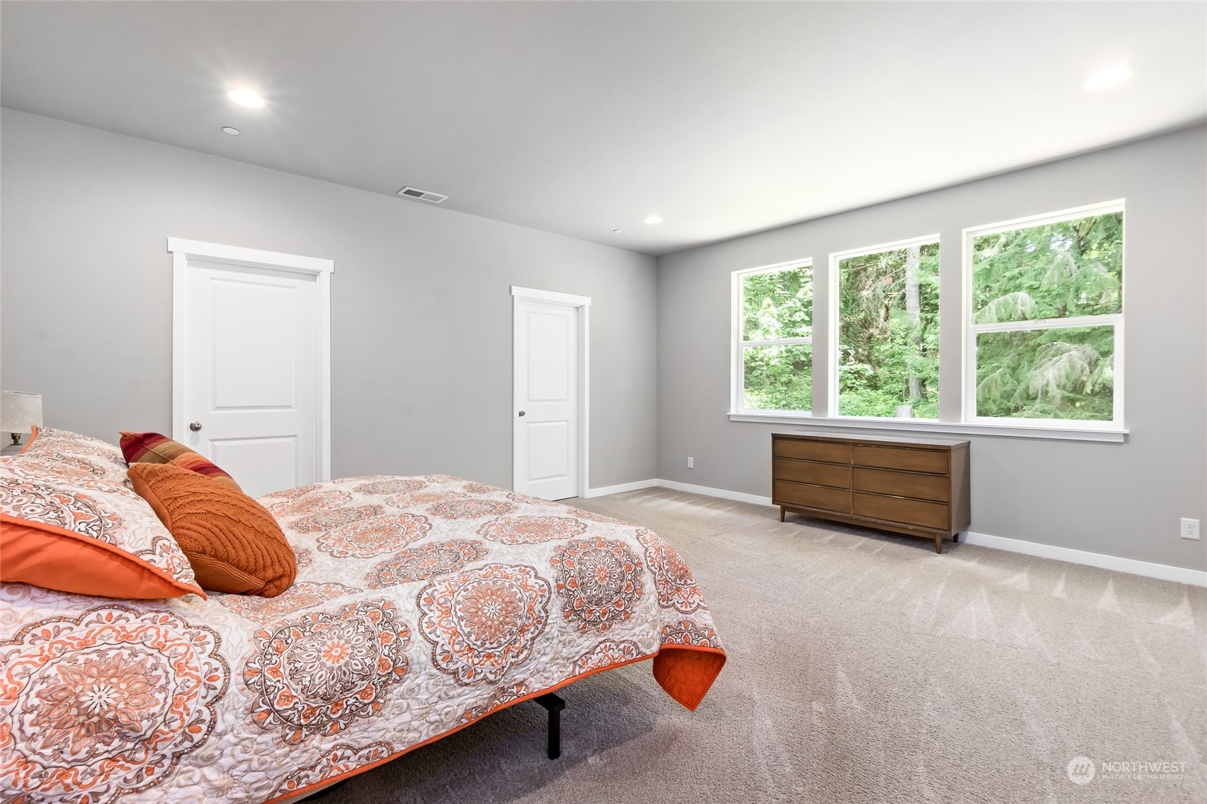 7101 Vandermark Road East Bonney Lake, WA 98391 - Photo 19 of 39 a bedroom with a bed and a window
