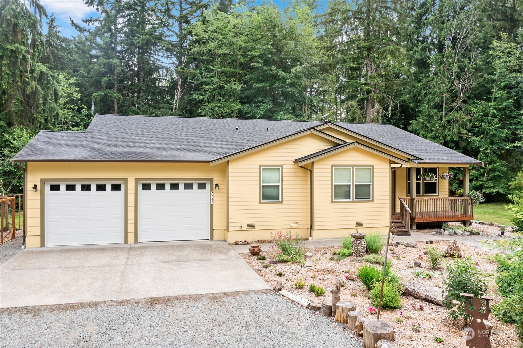 7101 Vandermark Road East Bonney Lake, WA 98391 - Photo 2 of 39 front view of house with a yard