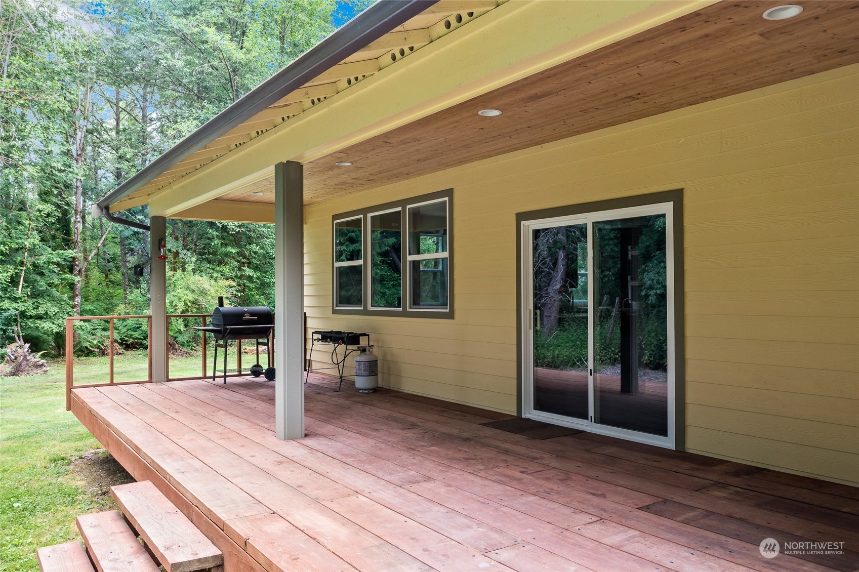 7101 Vandermark Road East Bonney Lake, WA 98391 - Photo 26 of 39 a house view with a outdoor space