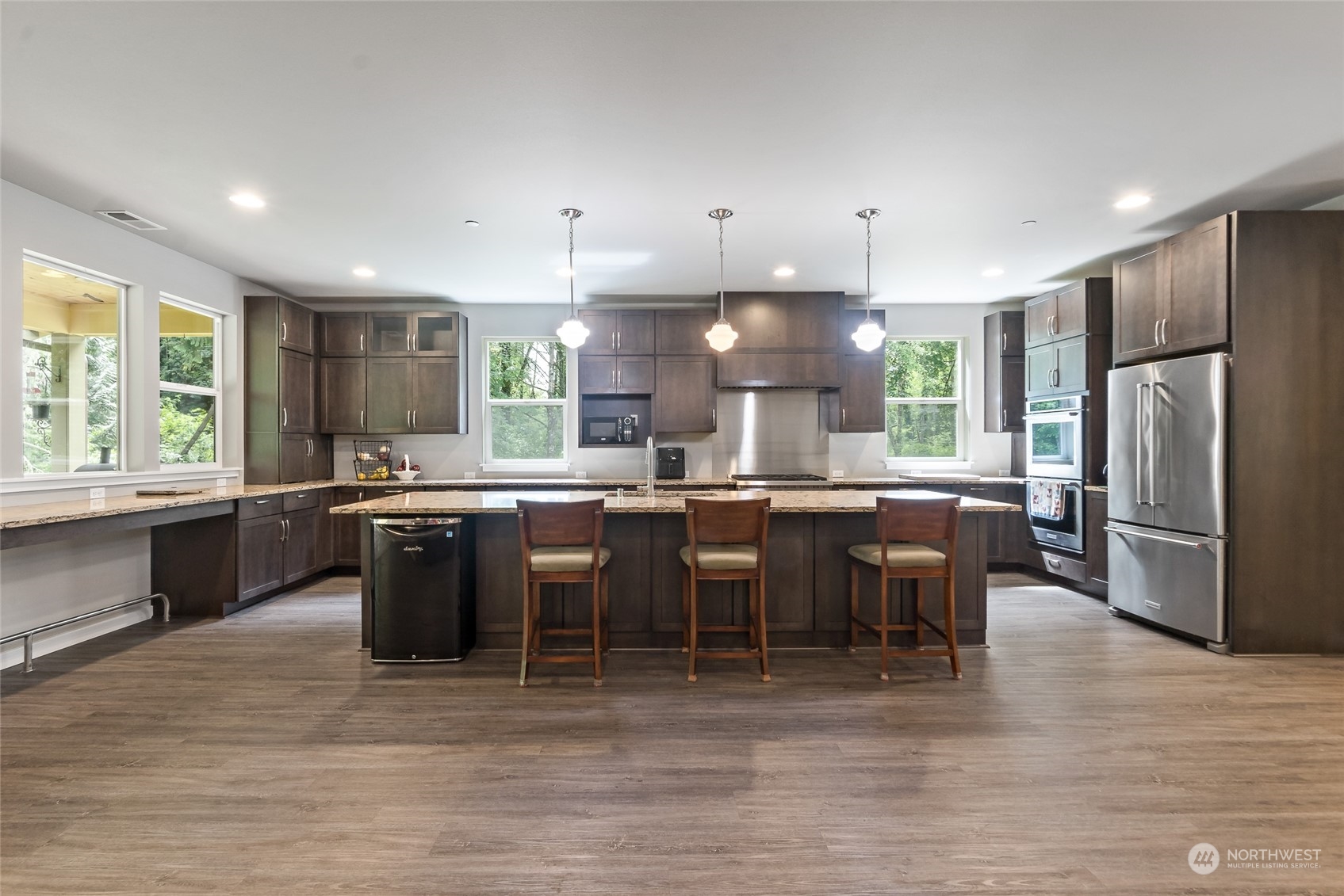 7101 Vandermark Road East Bonney Lake, WA 98391 - Photo 3 of 39 a kitchen with lots of counter top space