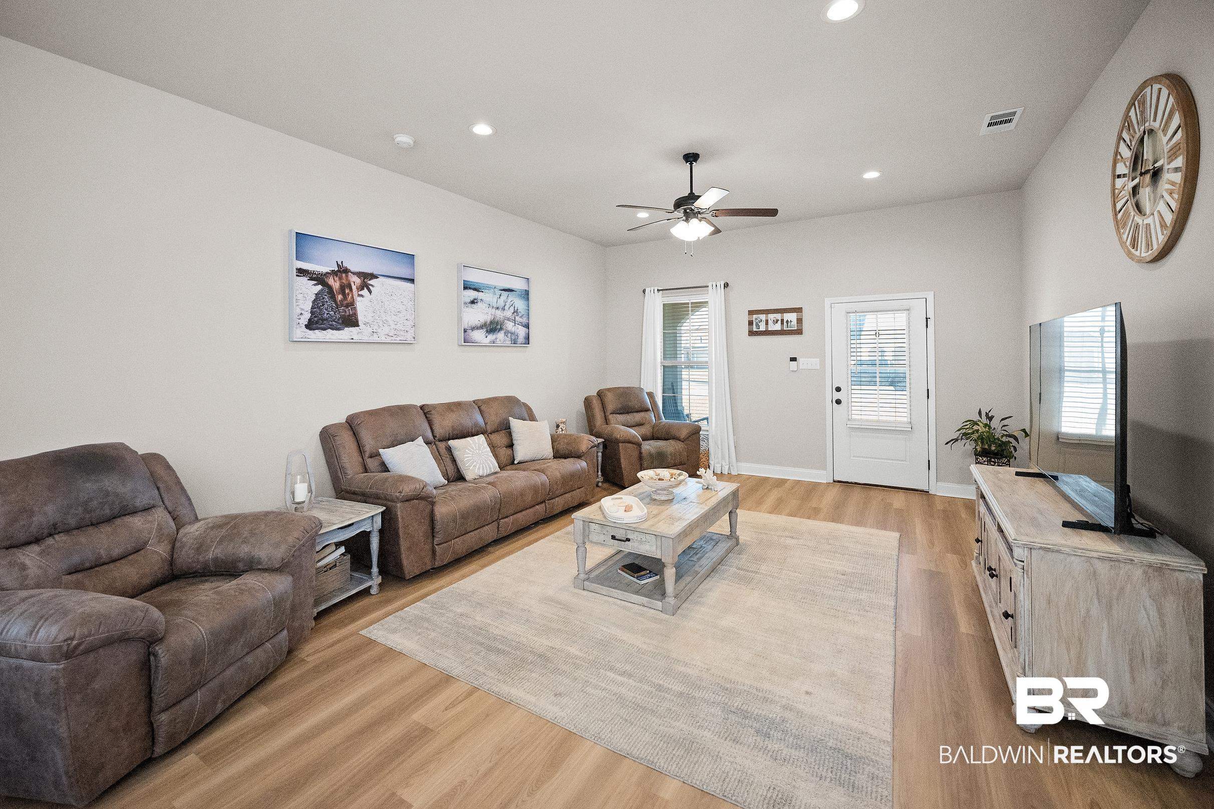 1077 Stella Road Foley, AL 36535 - Photo 8 of 27 Living room featuring light wood finished floors, a ceiling fan, and recessed lighting