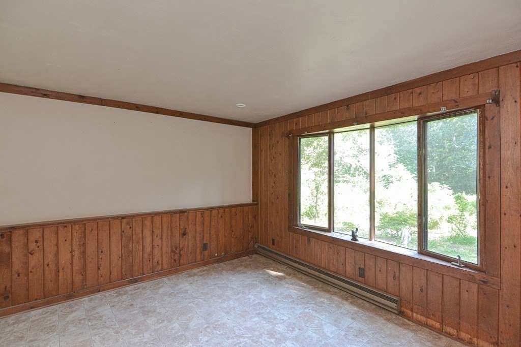 69 Stafford Road Holland, MA 01521 - Photo 15 of 27 a view of an empty room with a window