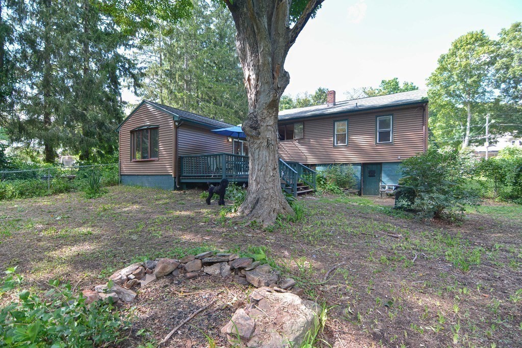 69 Stafford Road Holland, MA 01521 - Photo 24 of 27 a view of a house with a yard