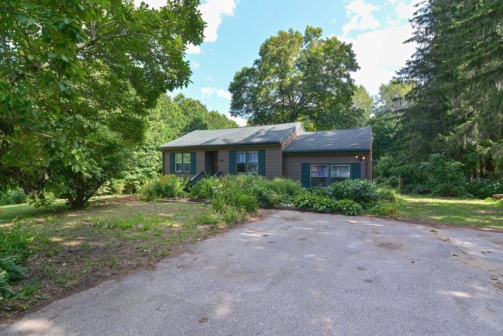 69 Stafford Road Holland, MA 01521 - Photo 27 of 27 a view of a house with a yard
