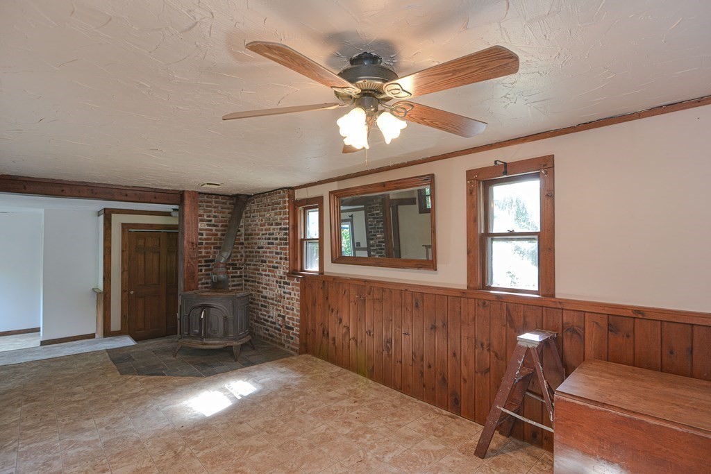 69 Stafford Road Holland, MA 01521 - Photo 7 of 27 a view of a livingroom with furniture and windows