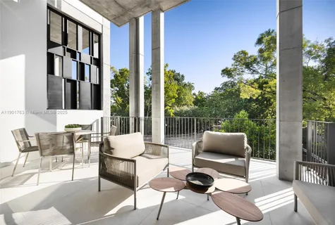 a building outdoor space with patio furniture