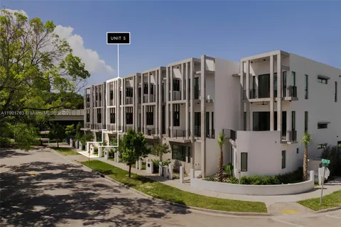 a front view of a building with street view
