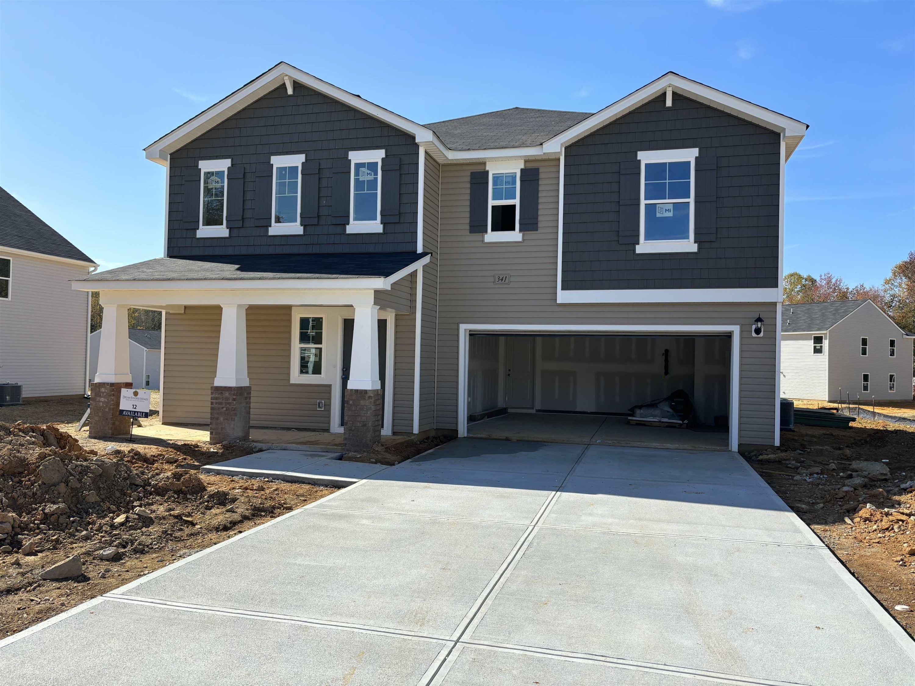 341 Riley Way Spring Hope, NC 27882 - Photo 1 of 13 a front view of a house with yard