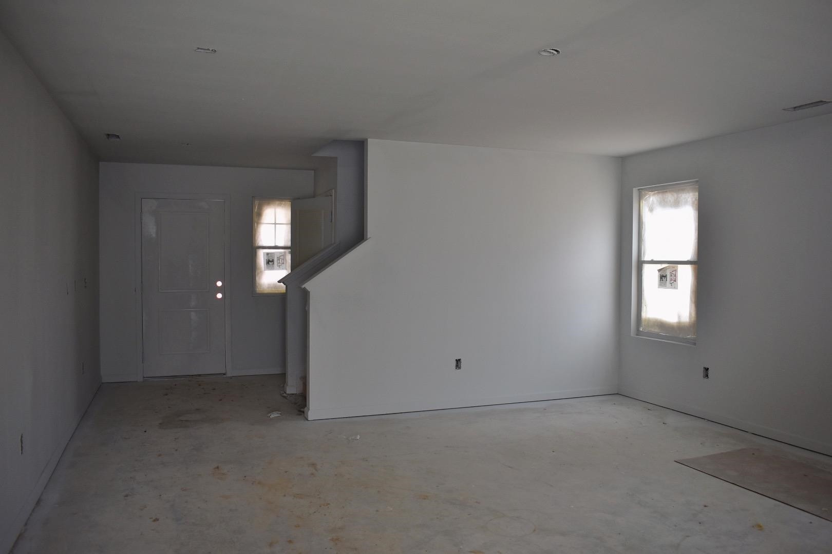 341 Riley Way Spring Hope, NC 27882 - Photo 8 of 13 an empty room with windows and closet