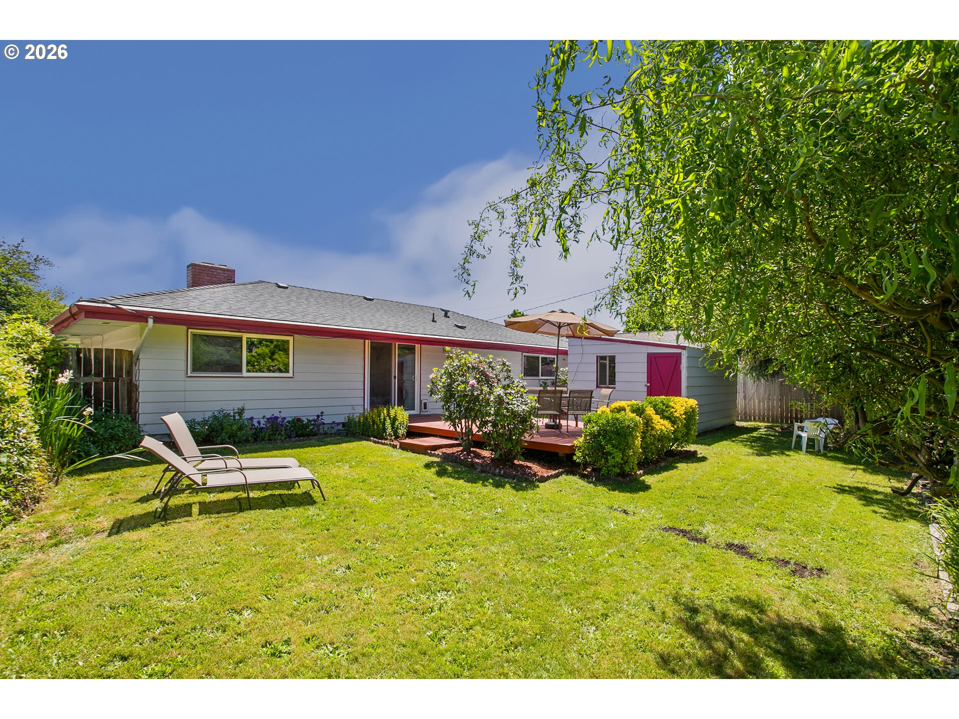 2840 Ferry Street Eugene, OR 97405 - Photo 23 of 35 a view of a house with backyard porch and sitting area