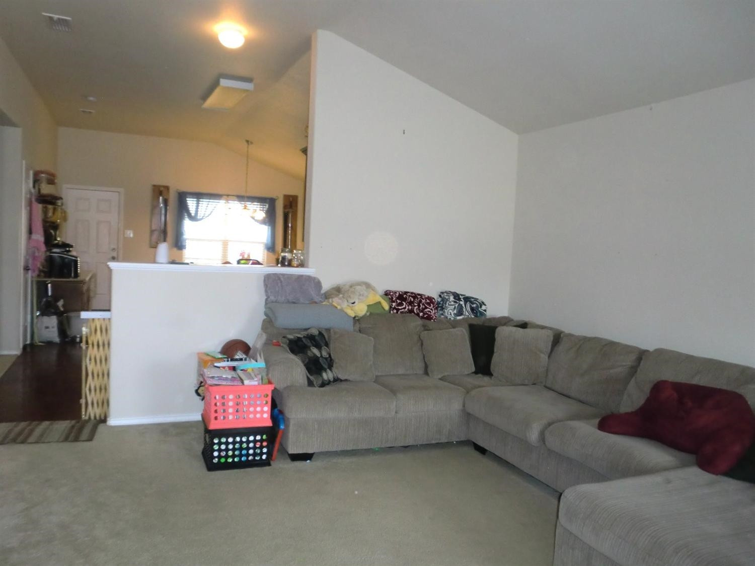 6706 84th Street Lubbock, TX 79424 - Photo 6 of 10 a living room with furniture and a couch