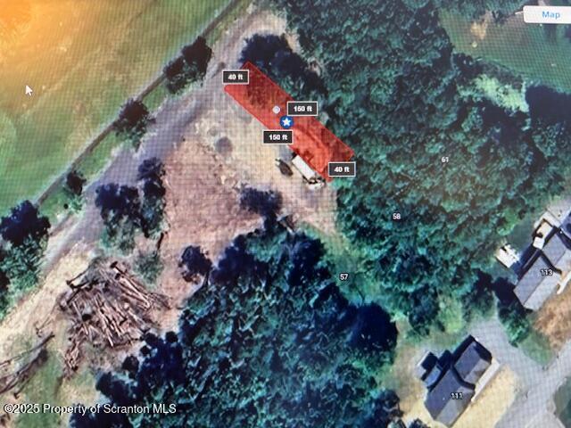 Crystal Lake Boulevard Carbondale, PA 18407 - Photo 1 of 1 an aerial view of a house with a yard and large trees