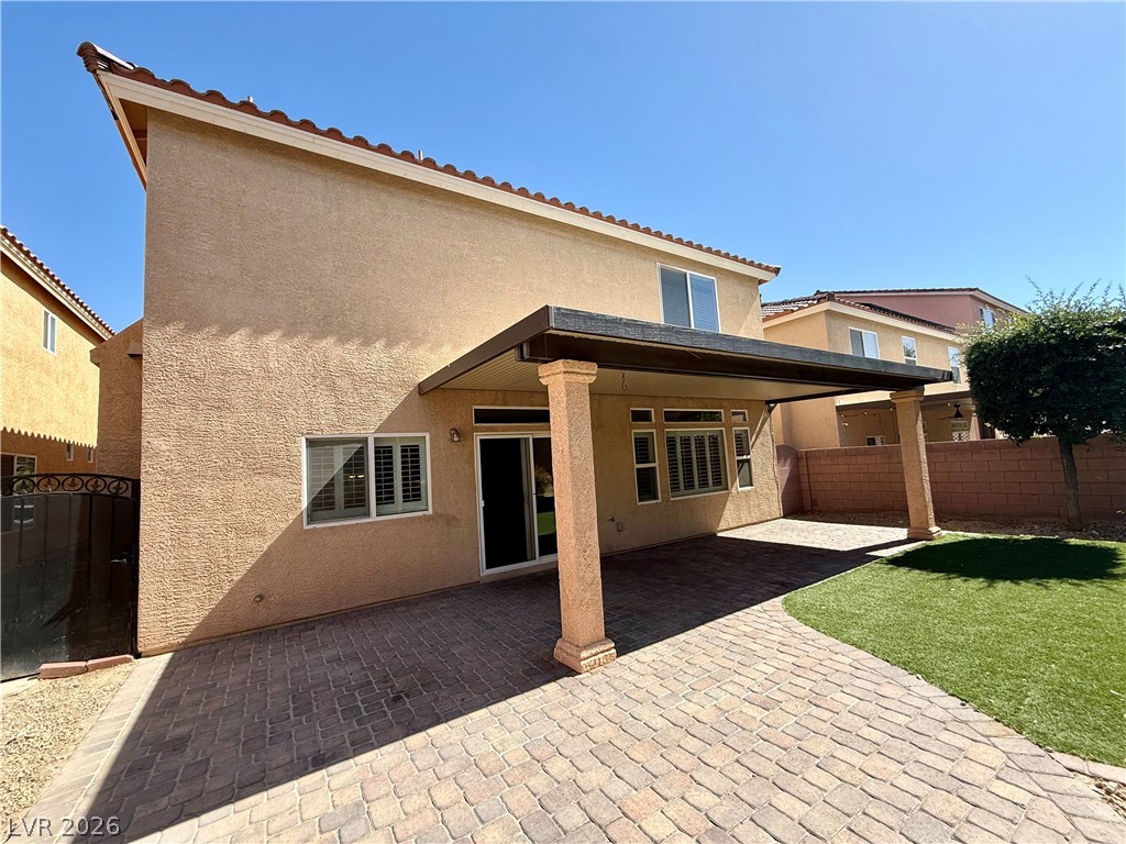 6459 Parrot Ridge Court Las Vegas, NV 89139 - Photo 19 of 23 An inviting covered patio offers ample space for outdoor enjoyment and entertainment.