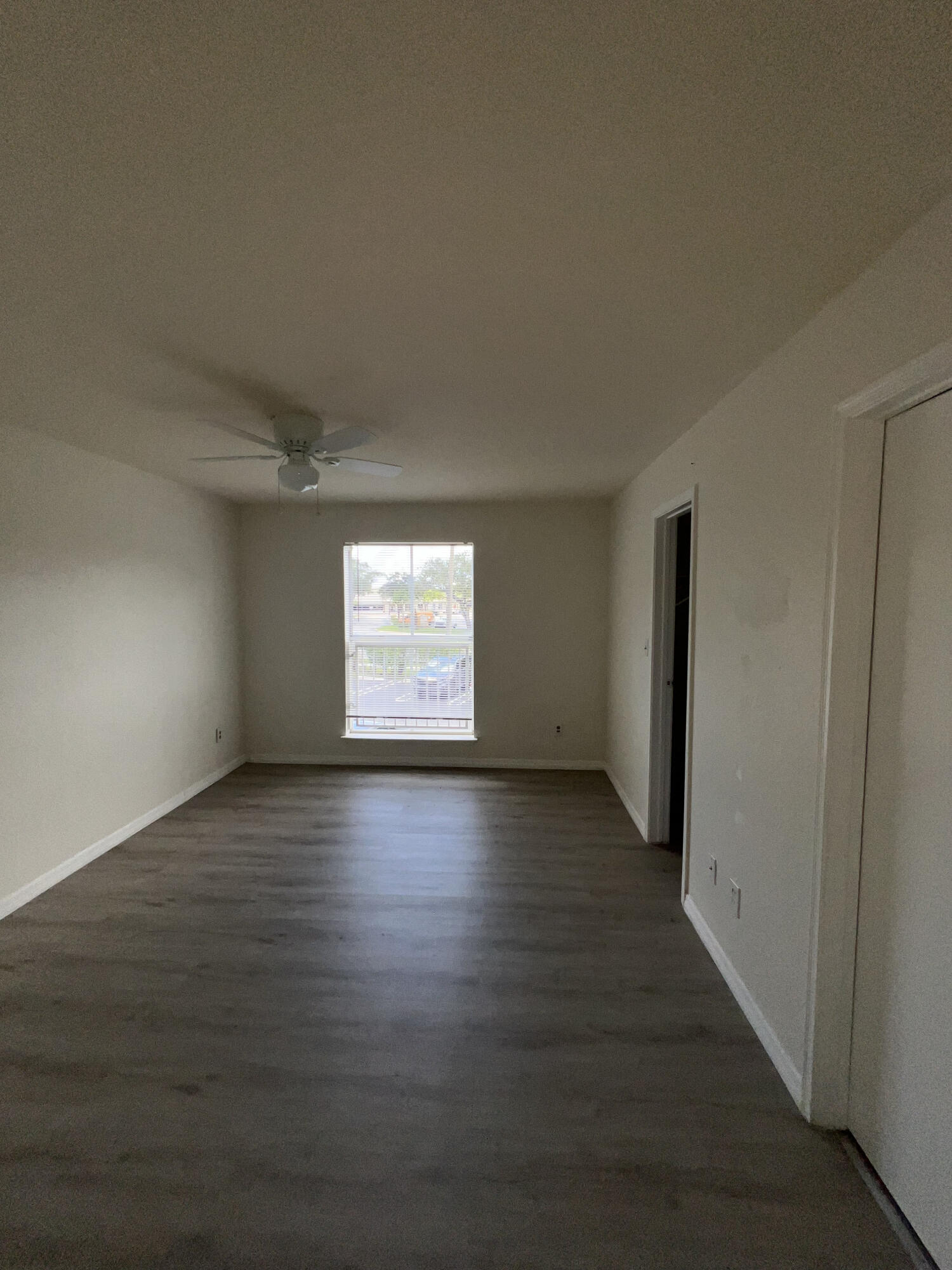 899 Riverside Drive, Unit 620 Coral Springs, FL 33071 - Photo 28 of 46 a view of a livingroom with wooden floor