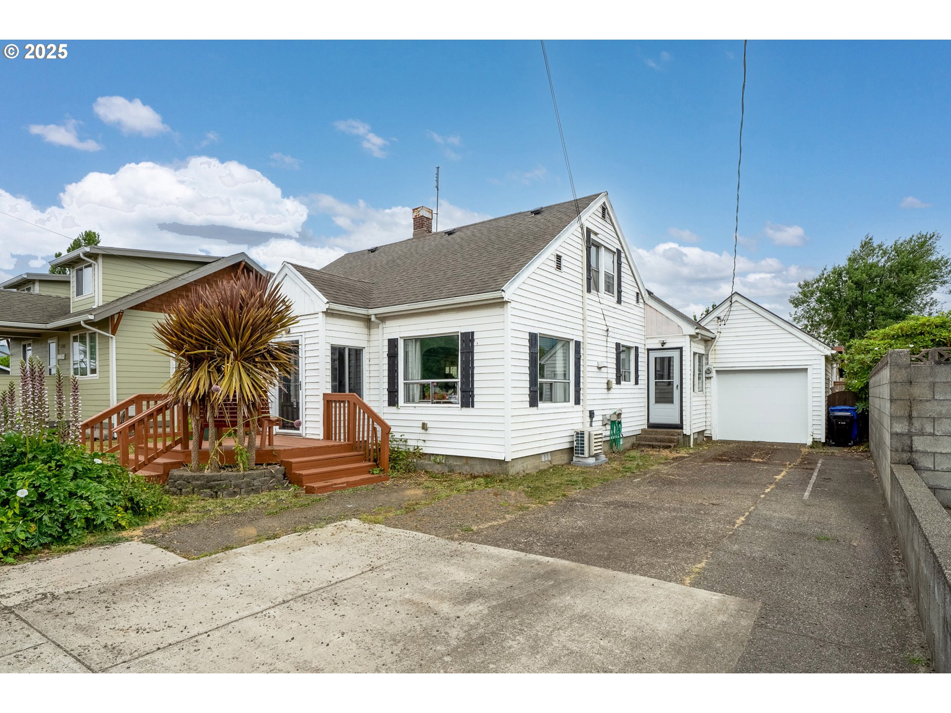 1706 5th Street Tillamook, OR 97141 - Photo 2 of 29 a view of a house with a patio