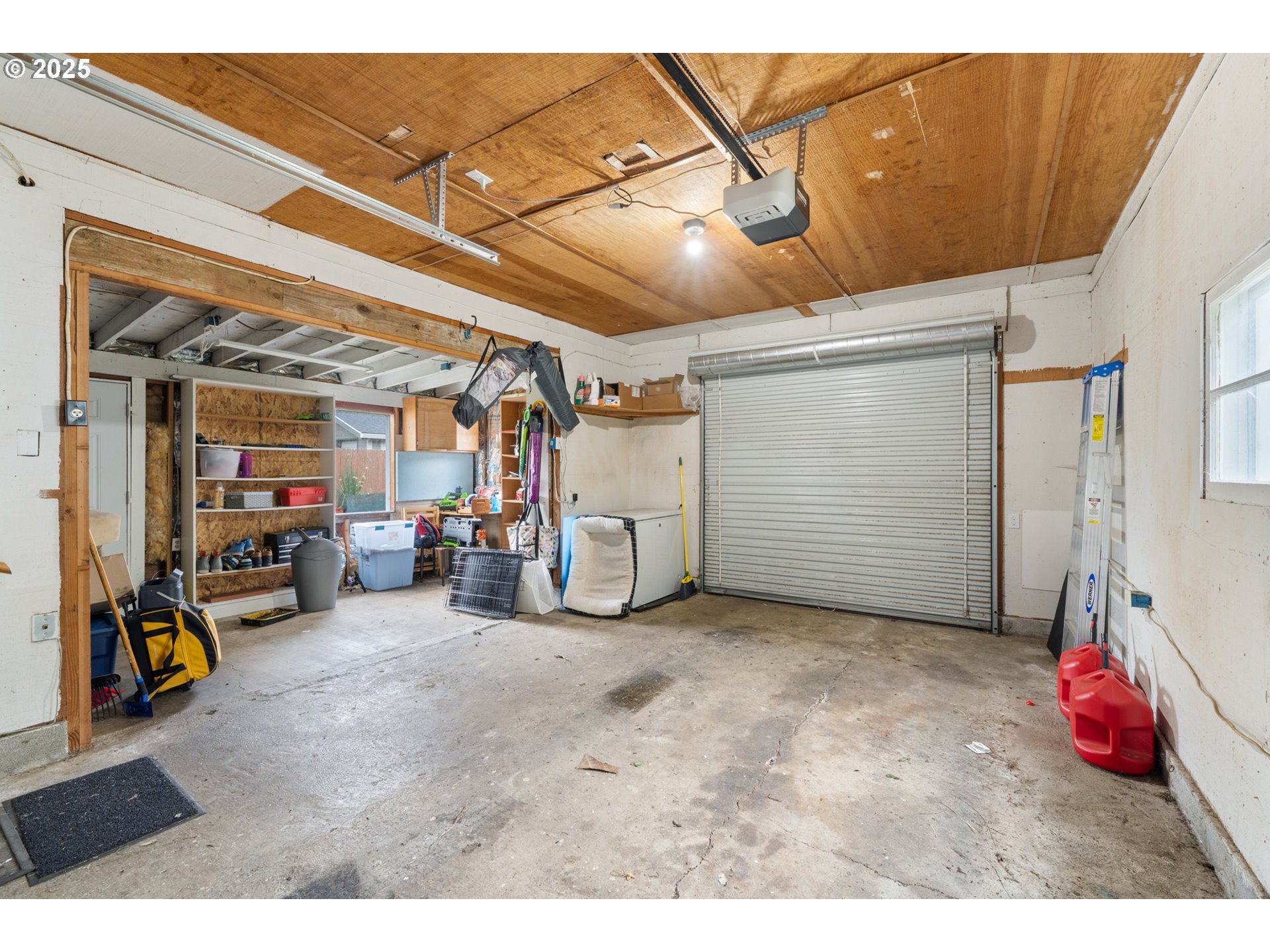 1706 5th Street Tillamook, OR 97141 - Photo 22 of 29 a view of a garage with storage