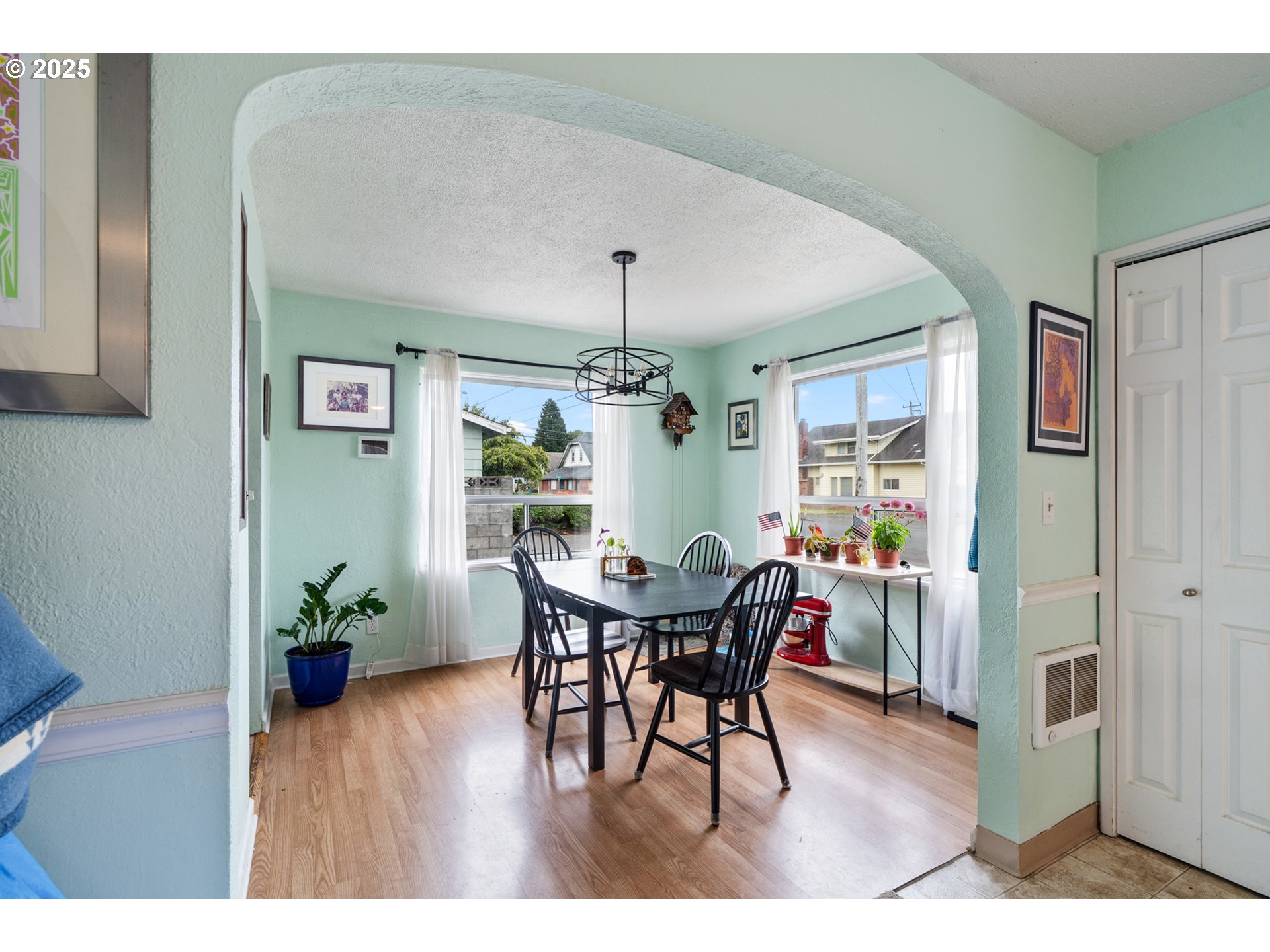 1706 5th Street Tillamook, OR 97141 - Photo 5 of 29 a view of a dining room with furniture and wooden floor