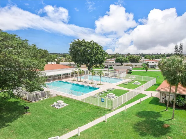 a view of a house with a big yard