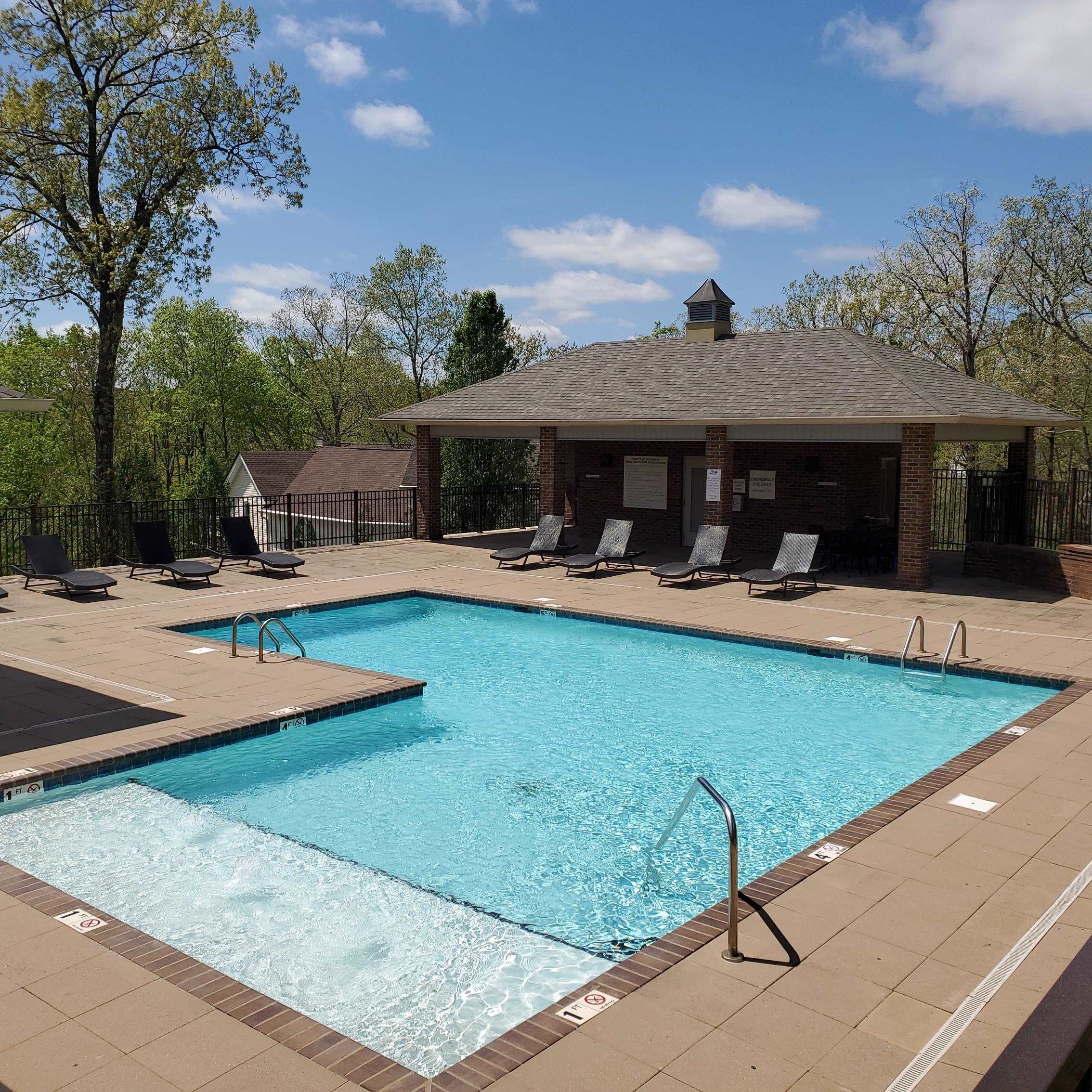 Lot 223 Ridgeview Cove Savannah, TN 38372 - Photo 8 of 12 a view of a backyard with a patio and fire pit