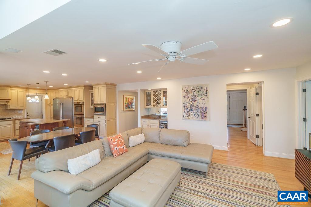 2976 Cove Trace Charlottesville, VA 22911 - Photo 13 of 62 a living room with furniture and wooden floor