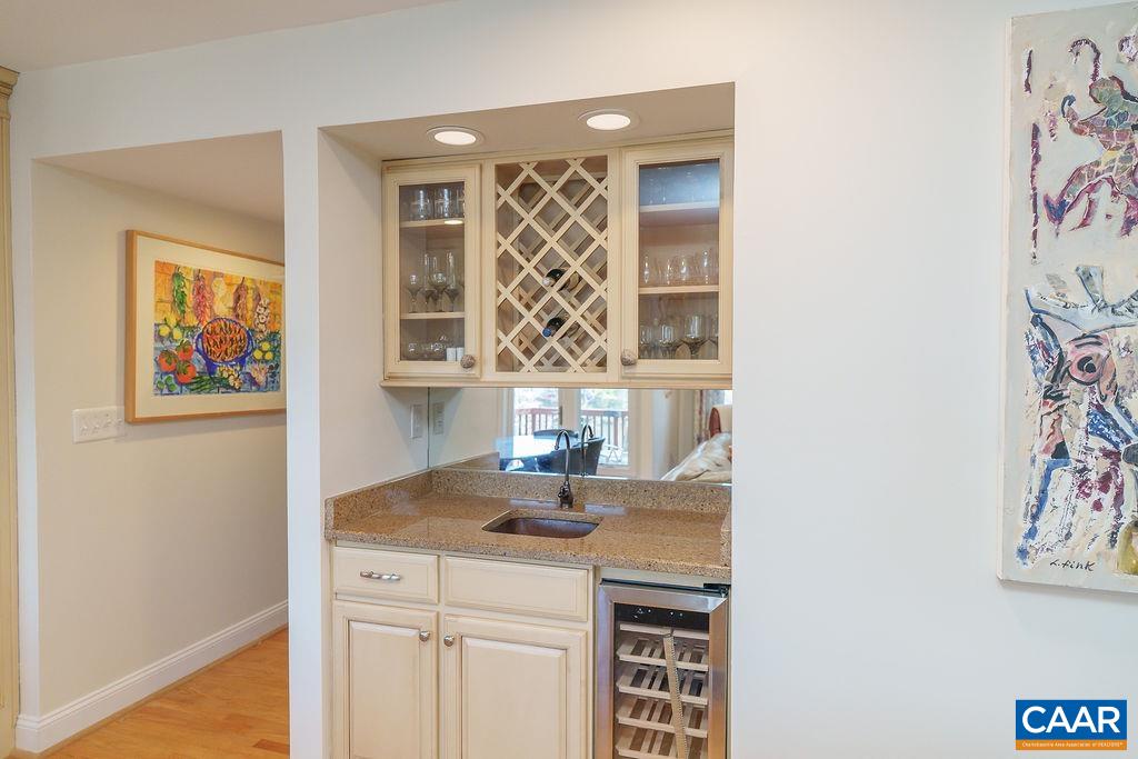 2976 Cove Trace Charlottesville, VA 22911 - Photo 14 of 62 a kitchen with a sink cabinets and a window