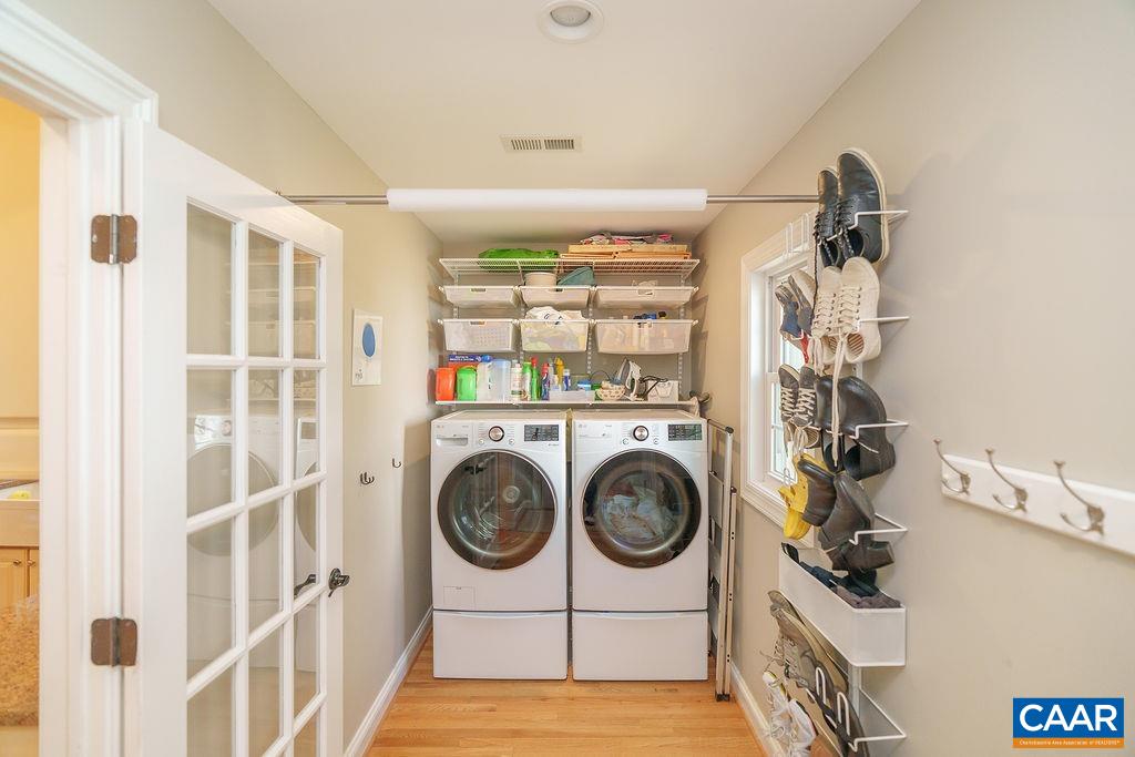 2976 Cove Trace Charlottesville, VA 22911 - Photo 22 of 62 a utility room with dryer and washer