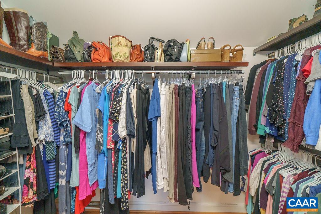 2976 Cove Trace Charlottesville, VA 22911 - Photo 29 of 62 a view of walk in closet with clothes