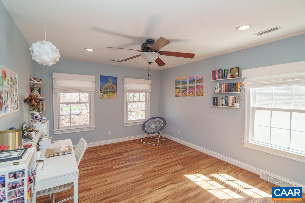 2976 Cove Trace Charlottesville, VA 22911 - Photo 37 of 62 a bedroom with furniture beds and a window