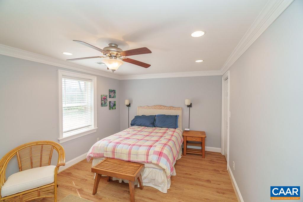 2976 Cove Trace Charlottesville, VA 22911 - Photo 39 of 62 a bedroom with a bed and window