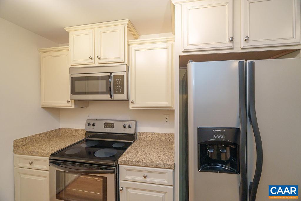 2976 Cove Trace Charlottesville, VA 22911 - Photo 42 of 62 a kitchen with stainless steel appliances granite countertop a refrigerator and a stove