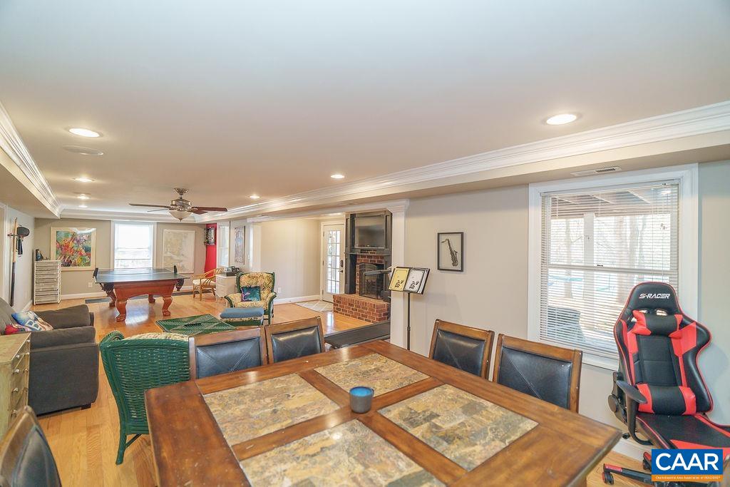 2976 Cove Trace Charlottesville, VA 22911 - Photo 47 of 62 a living room with lots of furniture and wooden floor