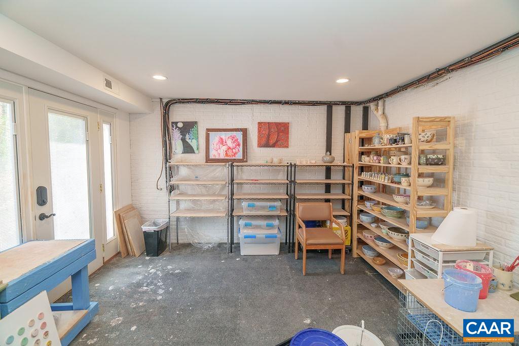 2976 Cove Trace Charlottesville, VA 22911 - Photo 49 of 62 a view of a livingroom with furniture and staircase
