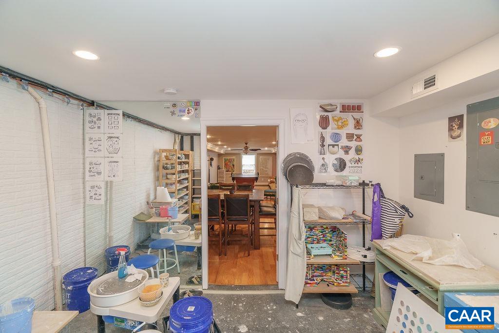 2976 Cove Trace Charlottesville, VA 22911 - Photo 50 of 62 a living room with furniture and a table