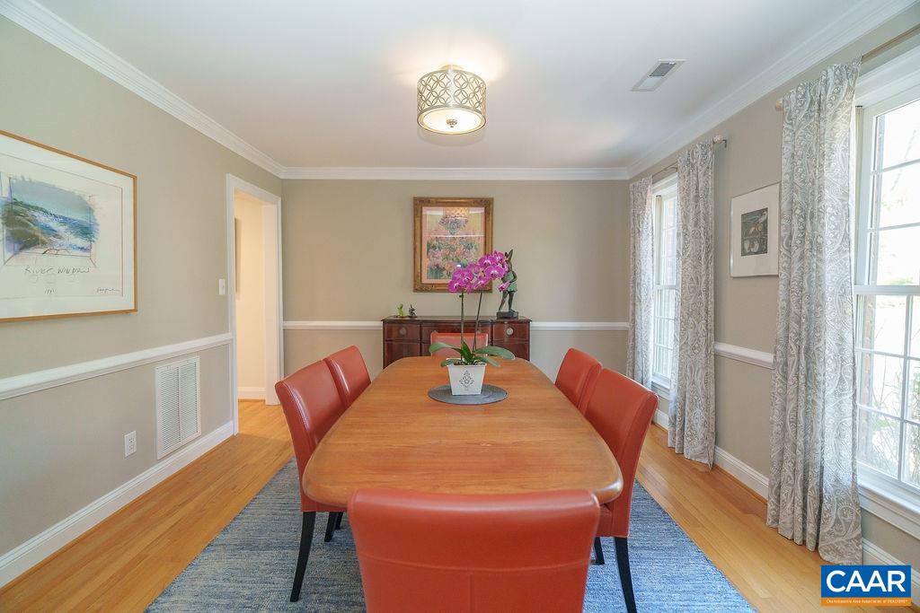 2976 Cove Trace Charlottesville, VA 22911 - Photo 6 of 62 a dining room with furniture and wooden floor