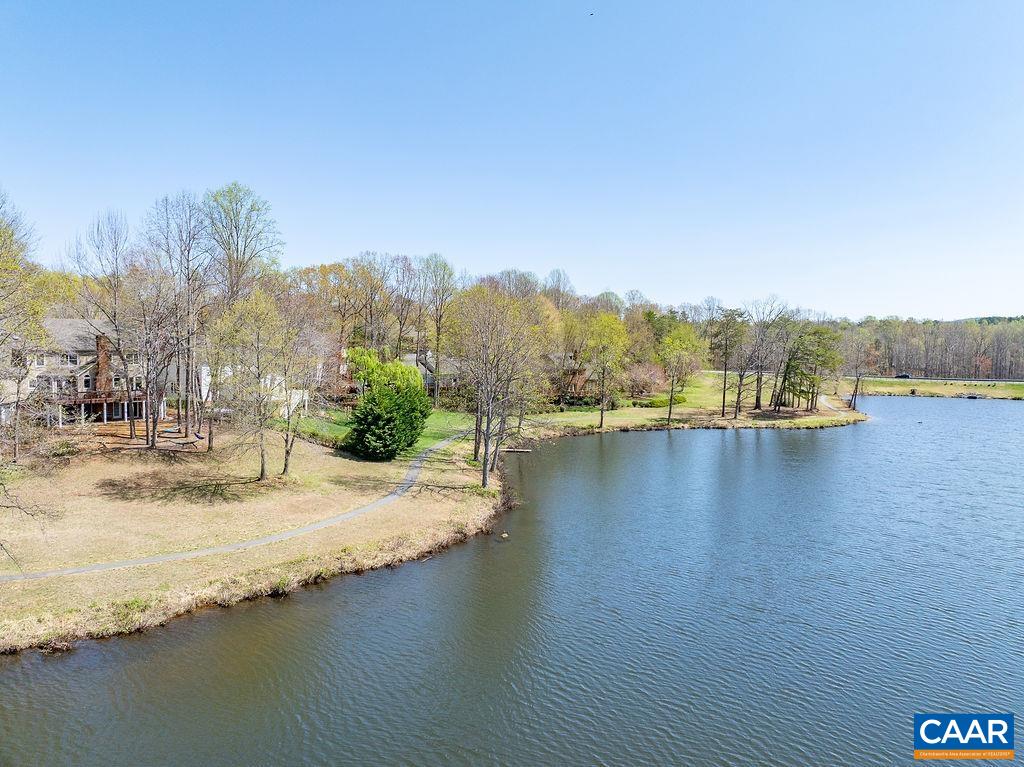 2976 Cove Trace Charlottesville, VA 22911 - Photo 61 of 62 a view of a lake with houses