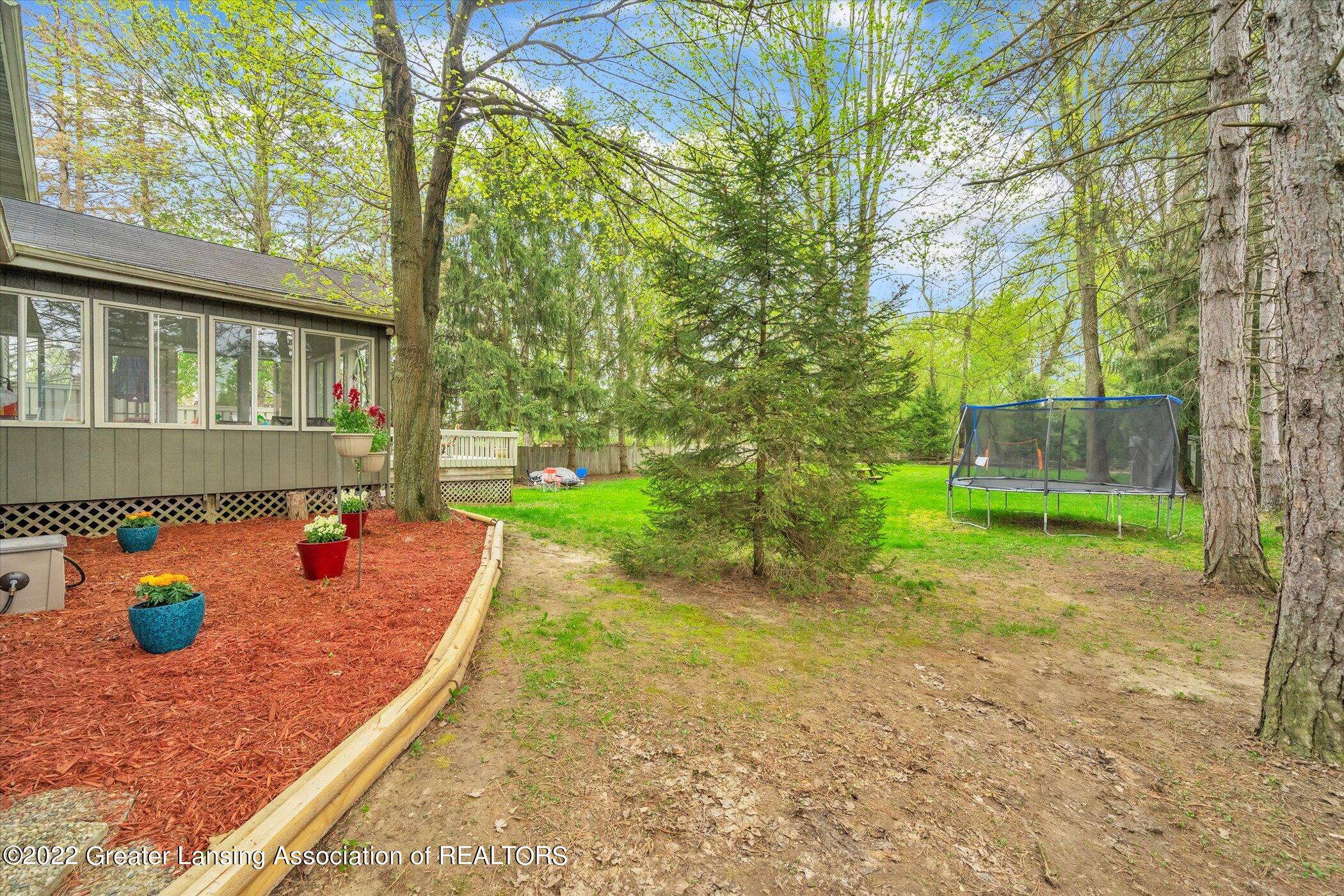 839 Spring Mill Drive Haslett, MI 48840 - Photo 37 of 48 40-839-Spring-Mill-Dr-WindowStill-Real-E
