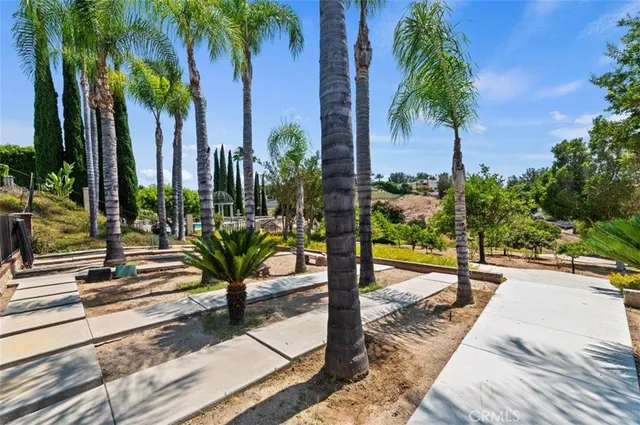 an aerial view of a residential houses with outdoor space
