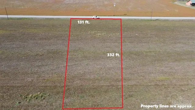 an aerial view of a golf course with a big yard