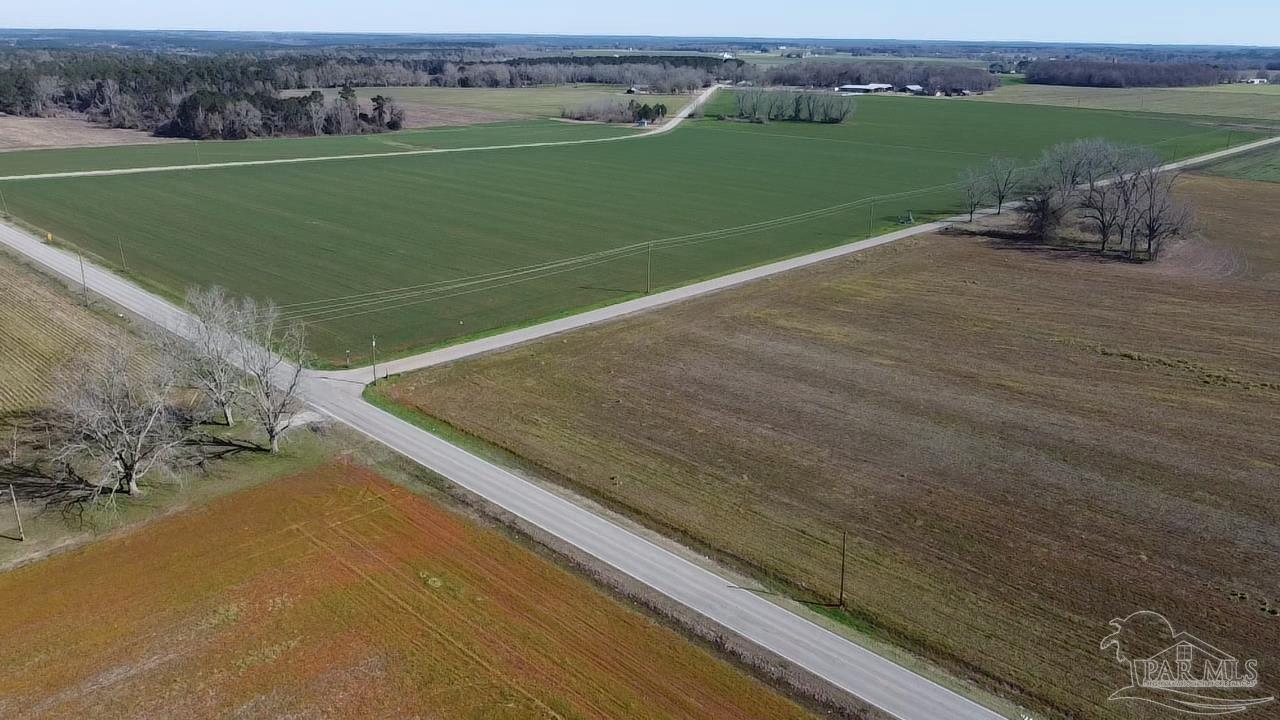 800-block Pouncey Road Atmore, AL 36502 - Photo 3 of 7 an aerial view of a golf course with a big yard