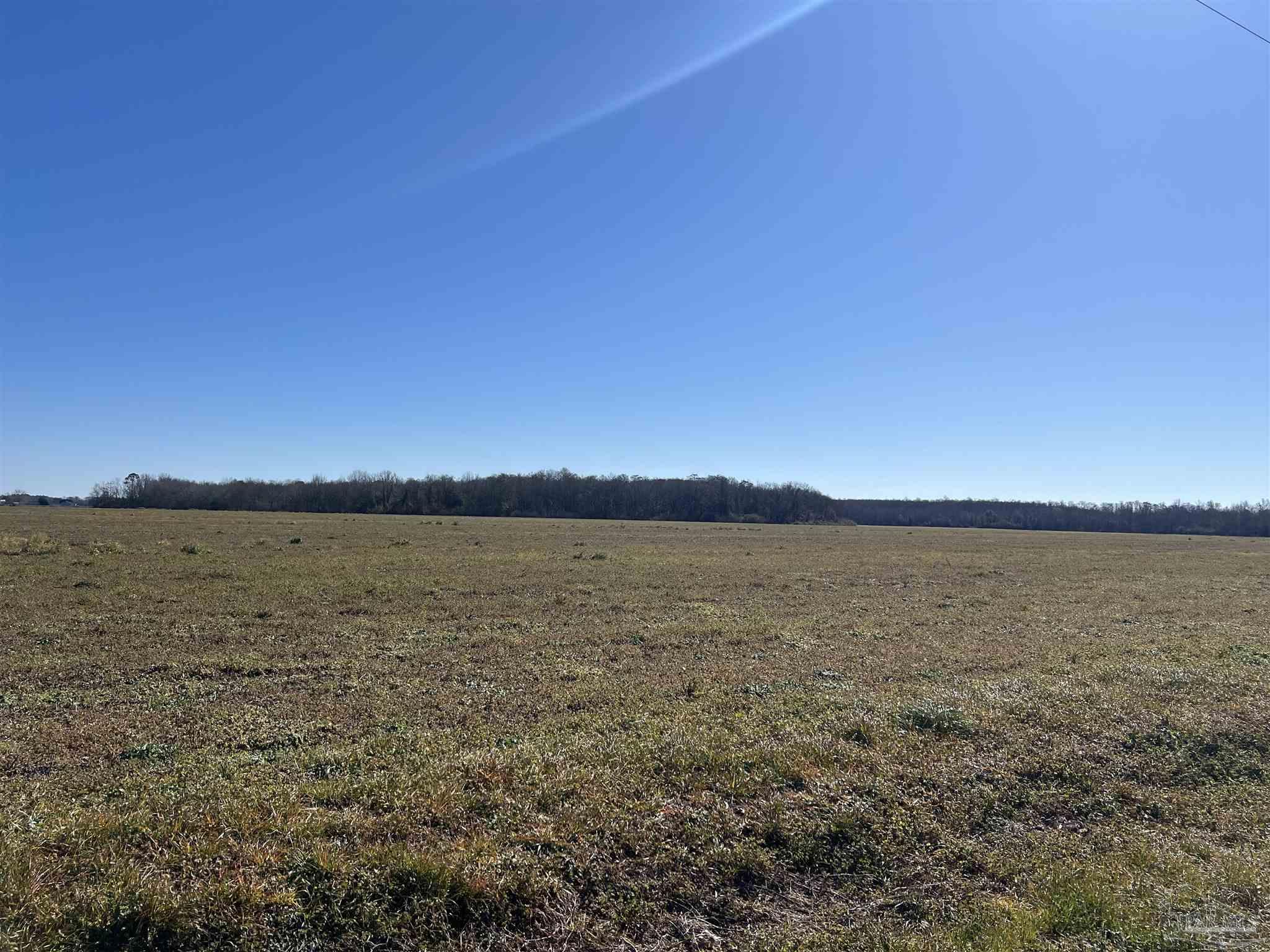 800-block Pouncey Road Atmore, AL 36502 - Photo 6 of 7 a view of lake and sunset