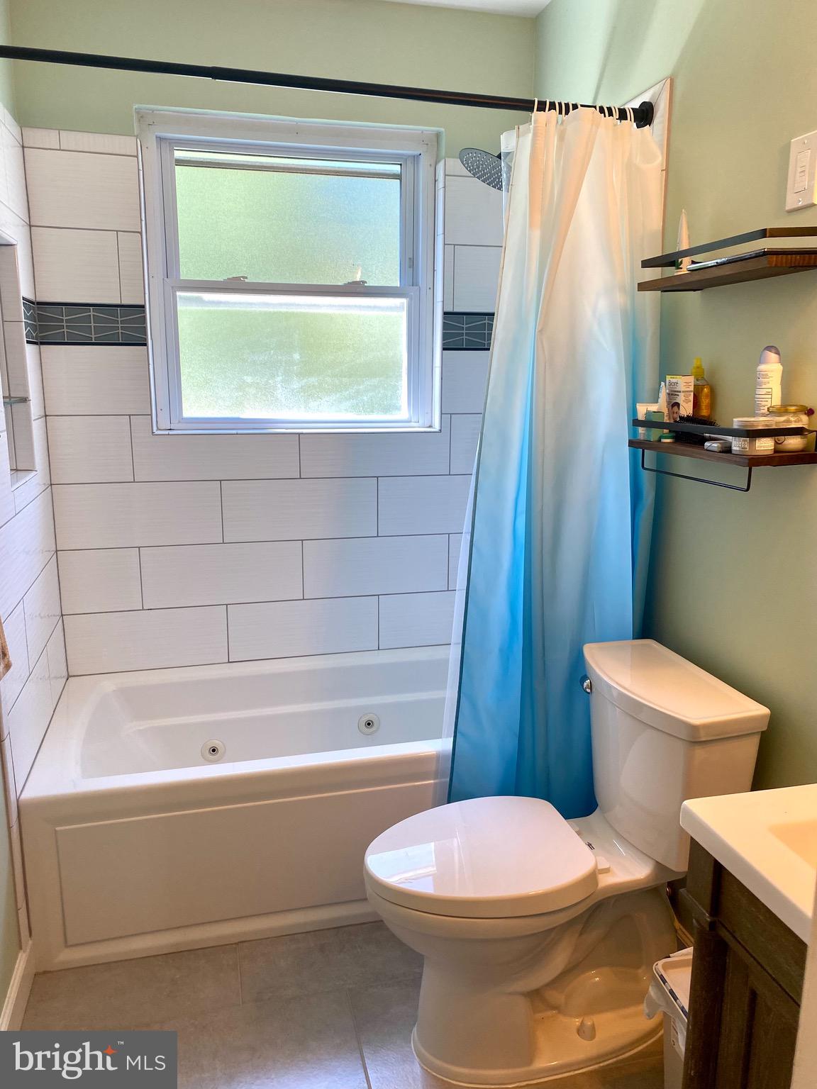 9901 Markham Street Silver Spring, MD 20901 - Photo 24 of 43 Renovated Bath with jetted tub