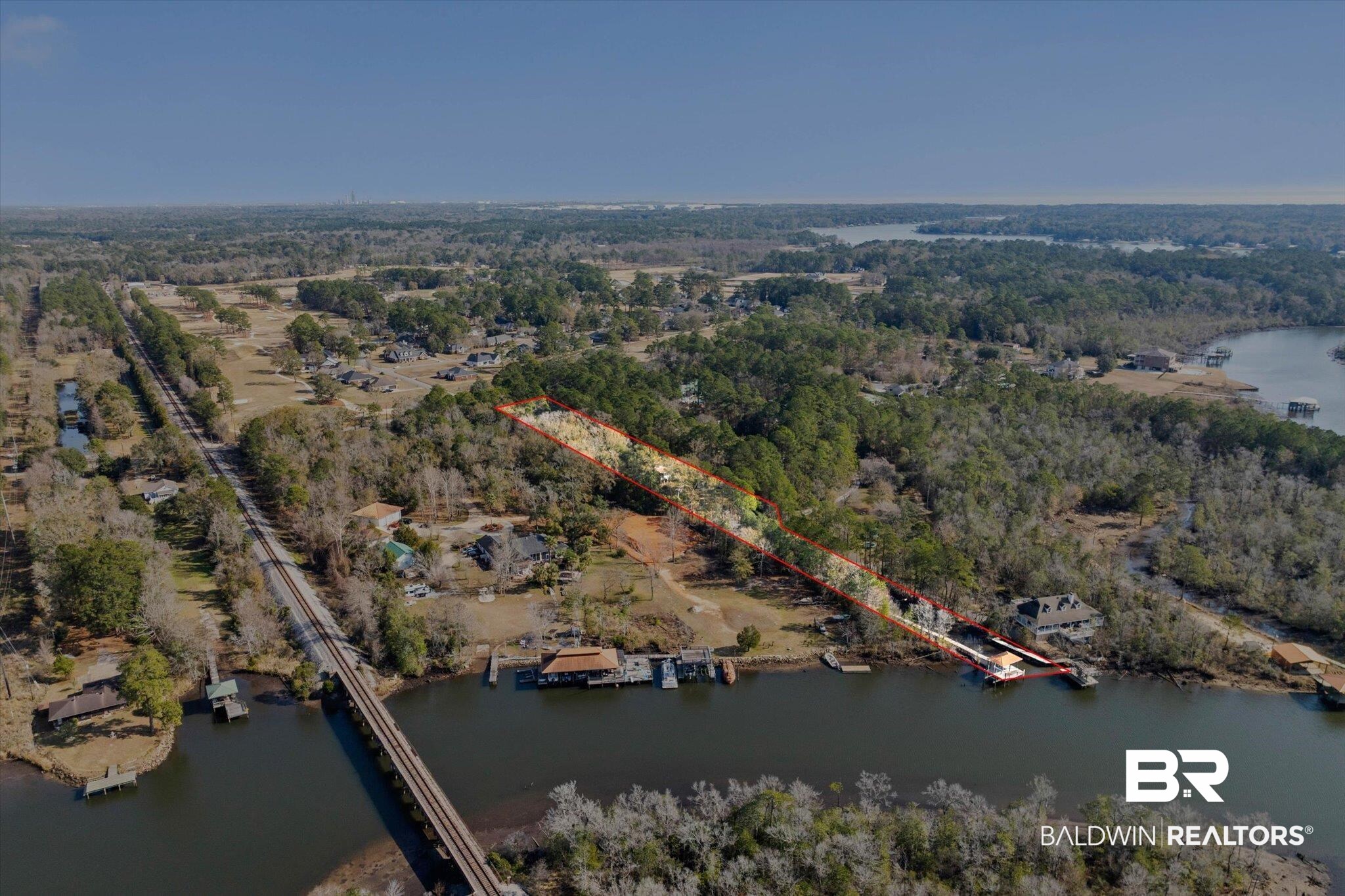 3847 Riviere Du Chien Road Mobile, AL 36693 - Photo 37 of 51 Aerial overview of property's location with a large body of water and property parcel outlined