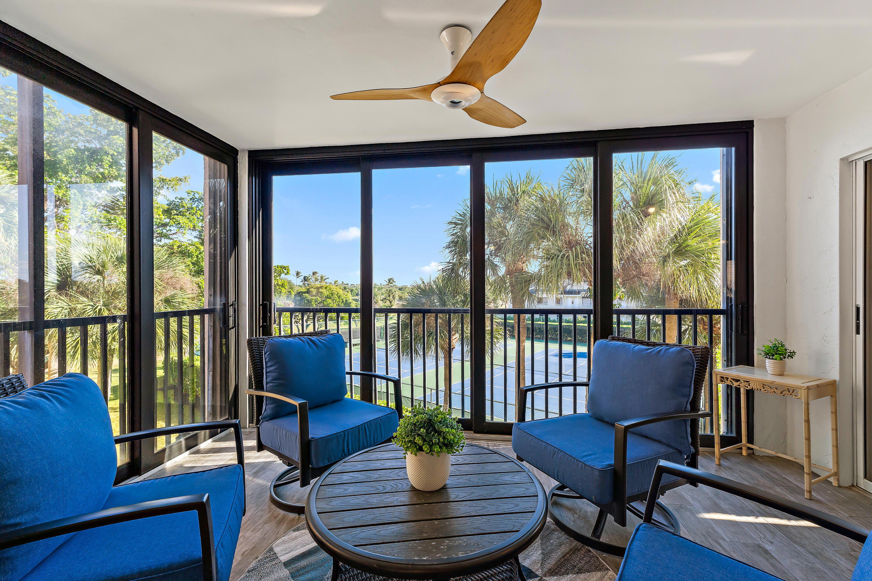 275 Palm Avenue, Unit A301 Jupiter, FL 33477 - Photo 32 of 38 a living room with furniture and a large window