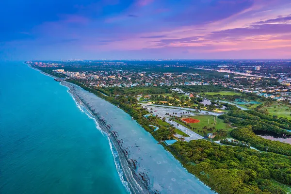 a view of a city with an ocean