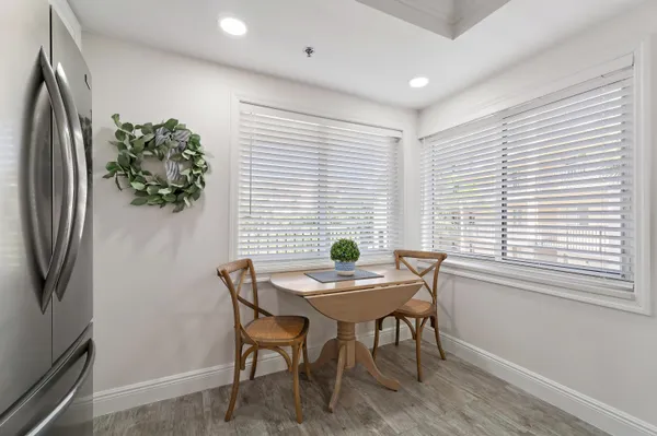 a view of a dining room with furniture window and outside view