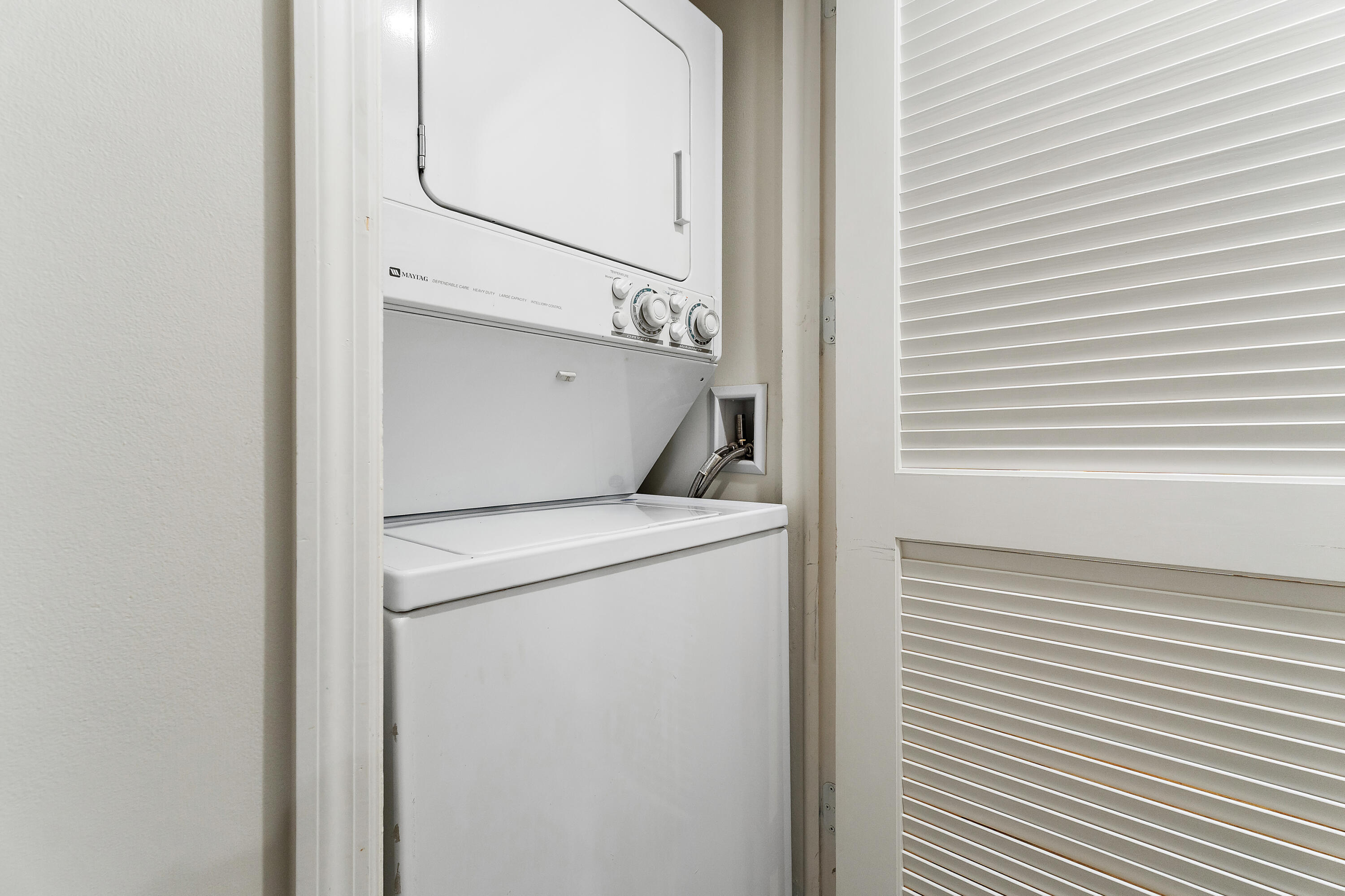 275 Palm Avenue, Unit A301 Jupiter, FL 33477 - Photo 9 of 38 a utility room with dryer and washer