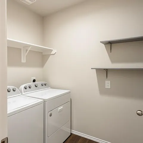 a utility room with dryer and washer