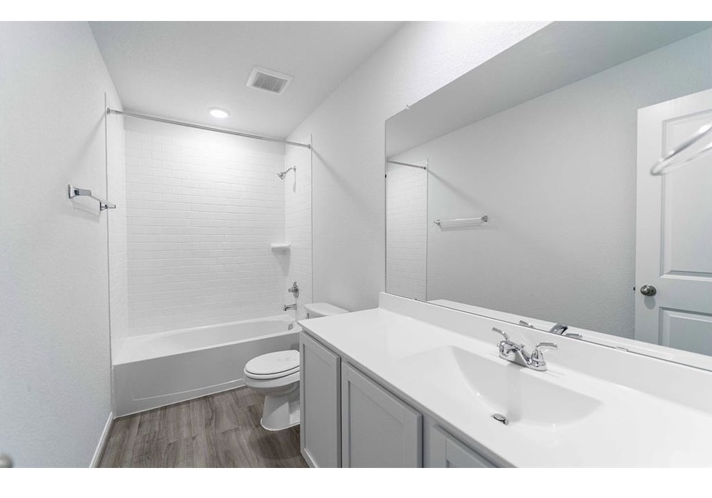 201 Lt. Rusty Jarrell, TX 76537 - Photo 10 of 14 a bathroom with a sink a toilet and shower